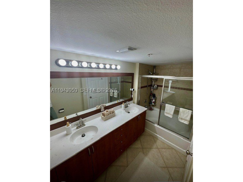 Move-in ready gem in the gated Emerald Dunes community! Bright - photo 5