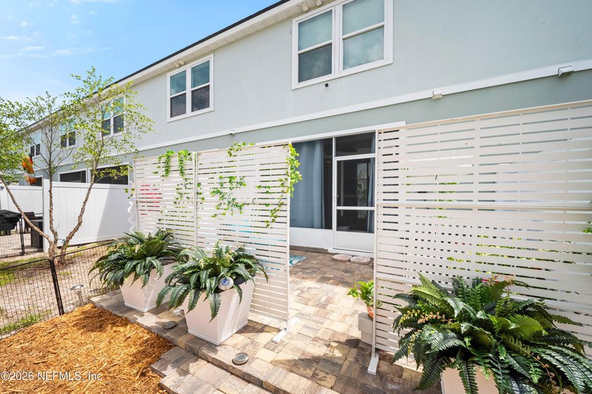 Nearly New Townhome with Backyard Oasis + Assumable 5.25% Loan! - photo 2