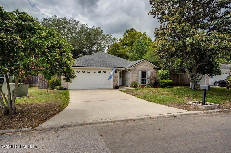 Welcome to 8005 Macinnes Drive - a charming home with great curb - photo 2