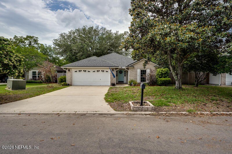 Welcome to 8005 Macinnes Drive - a charming home with great curb - photo 3