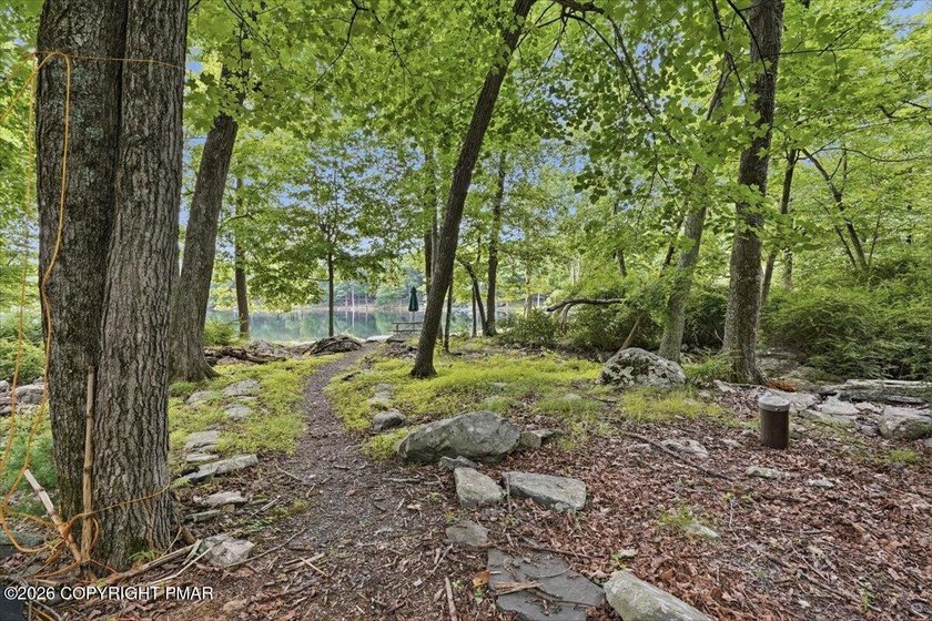 86 FEET OF GORGEOUS LAKEFRONT! -- the one thing no renovation - photo 5
