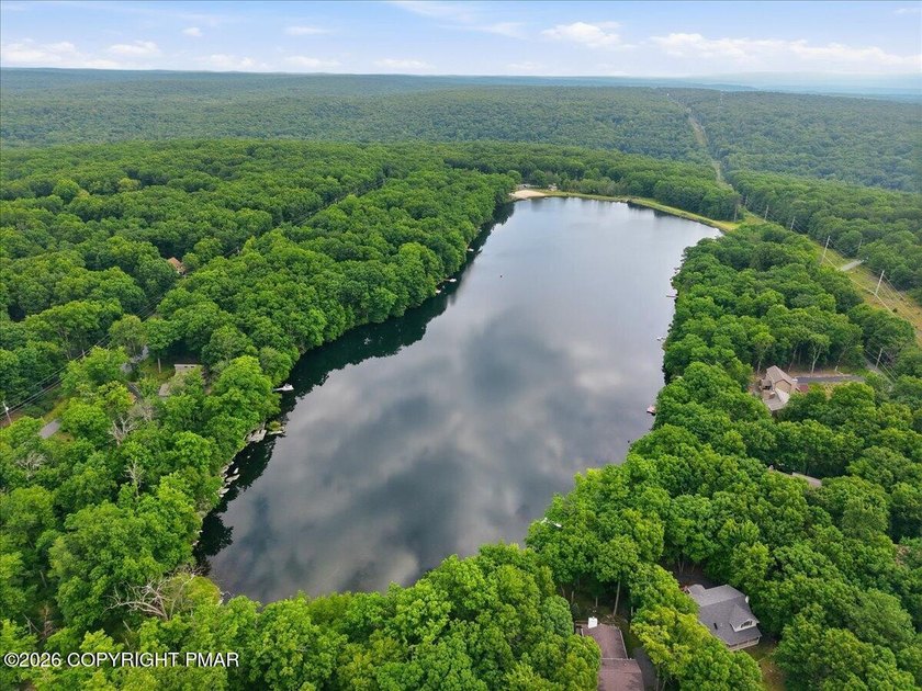 86 FEET OF GORGEOUS LAKEFRONT! -- the one thing no renovation - photo 7