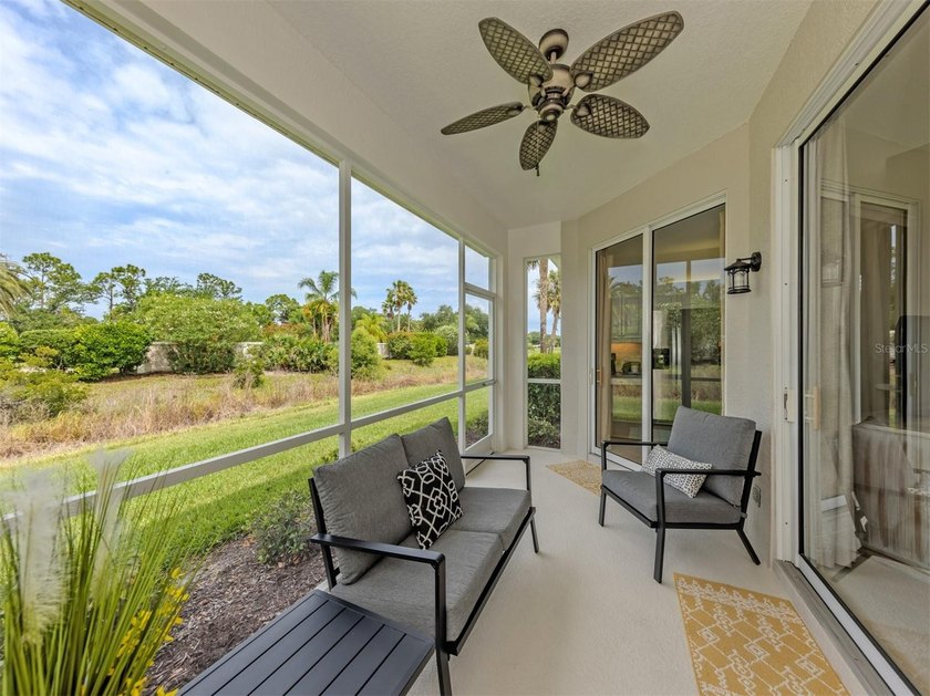 Beautifully maintained and offered furnished, this three-bedroom - photo 26