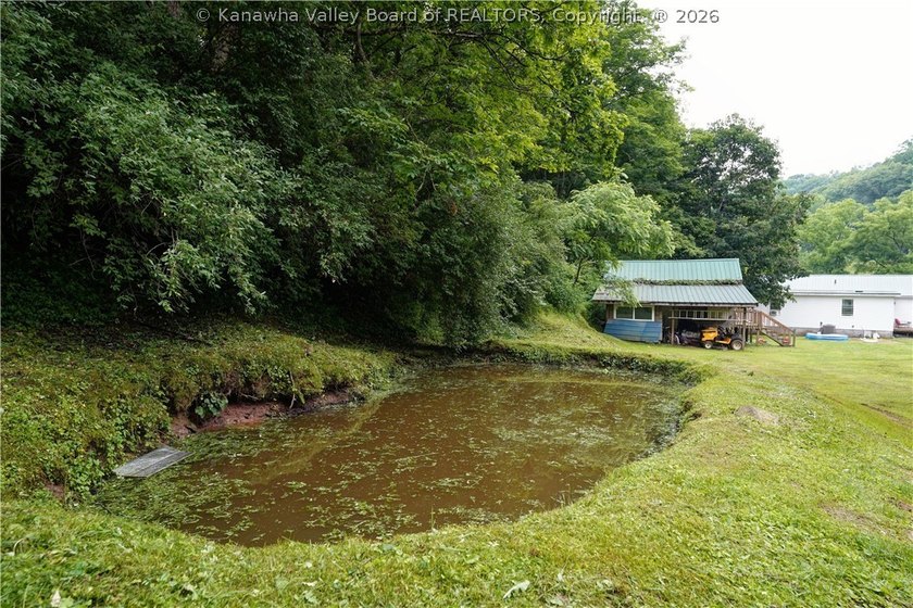 PEACEFUL, PRIVATE COUNTRY SETTING ON 1.2 ACRES IN POCA! THIS - photo 23