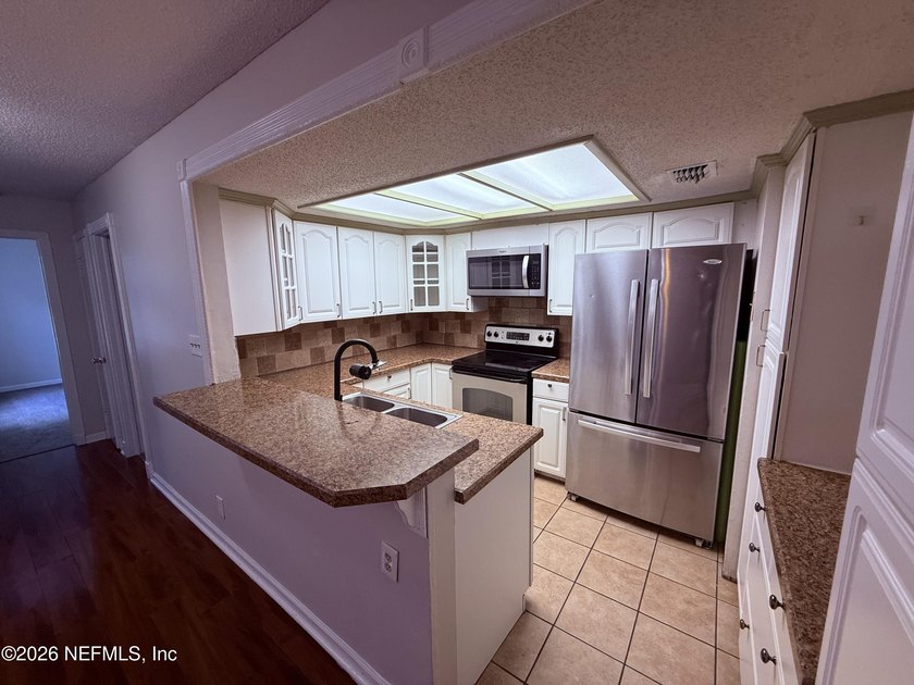 This home featurs durable luxury vinyl plank (LVP) flooring - photo 4