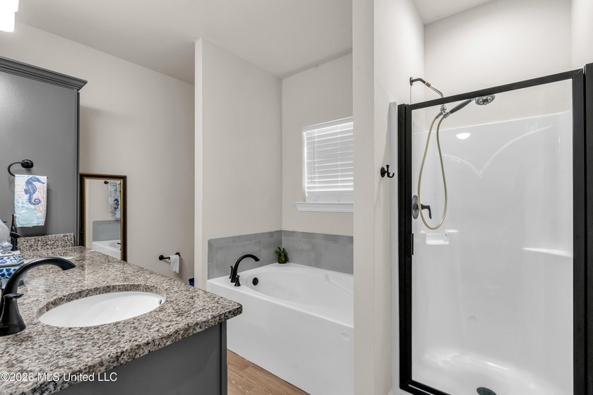 Step into modern comfort in this 2024 construction home located - photo 12