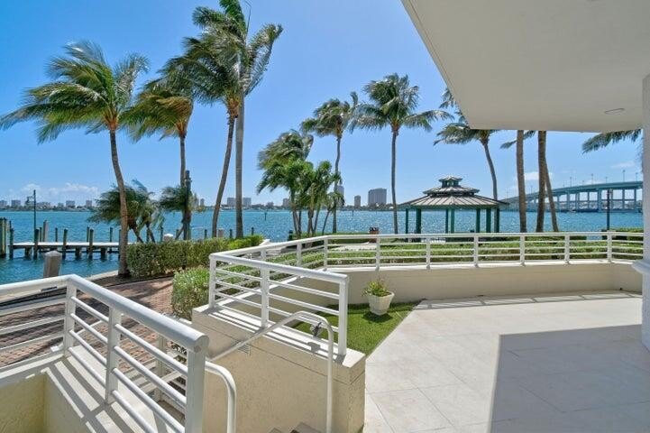 Located in the prestigious gated waterfront community of Marina - photo 3