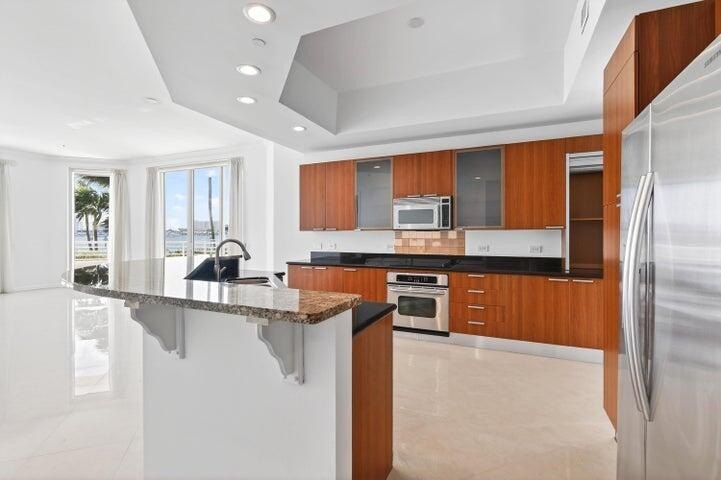 Located in the prestigious gated waterfront community of Marina - photo 6