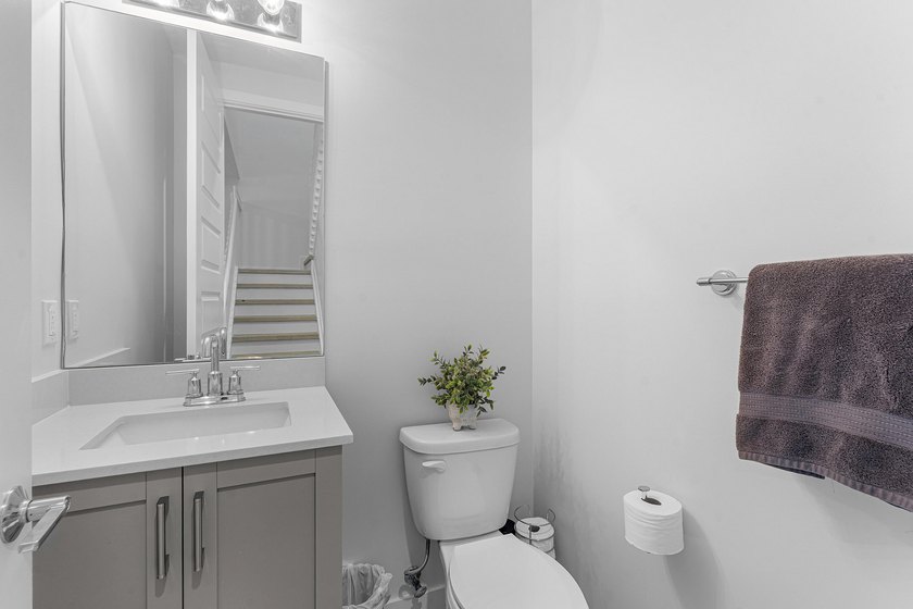Gorgeous, modern 4 bd/ 3.5 bath end unit townhome in the heart - photo 9