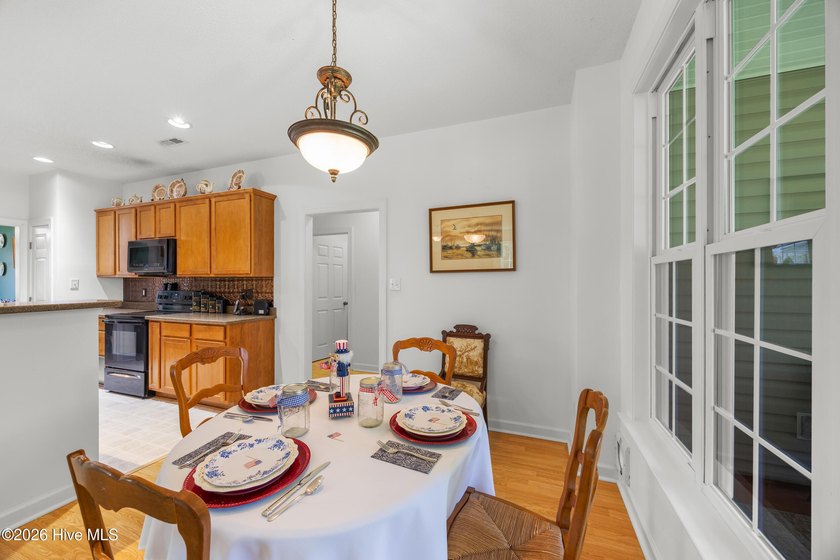 Coastal 4-Bedroom Home with First-Floor Primary Suite, 3-Car - photo 11