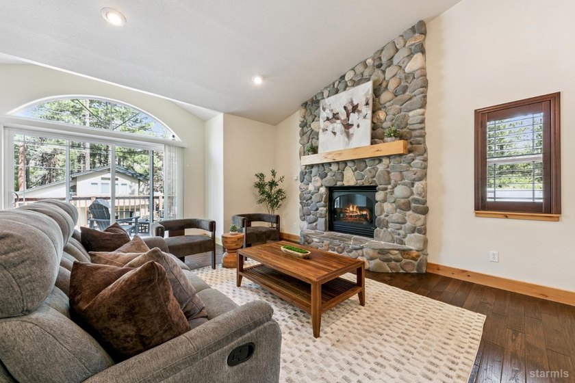 Located in the desirable Tahoe Island Park neighborhood, this - photo 2