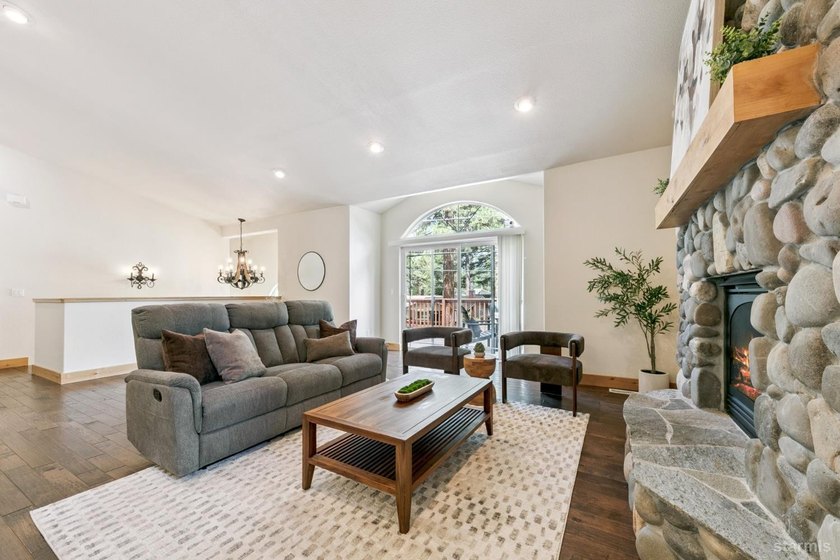 Located in the desirable Tahoe Island Park neighborhood, this - photo 3