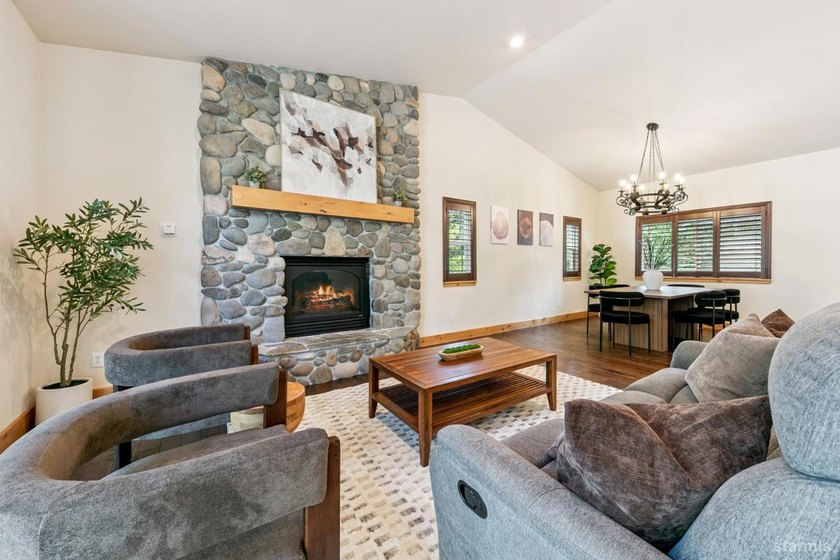 Located in the desirable Tahoe Island Park neighborhood, this - photo 4