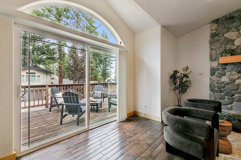 Located in the desirable Tahoe Island Park neighborhood, this - photo 6