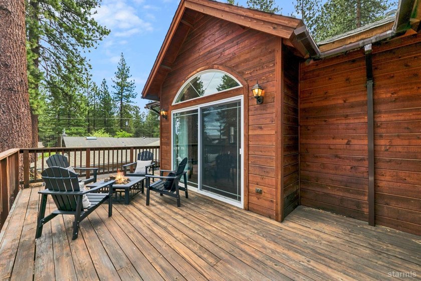 Located in the desirable Tahoe Island Park neighborhood, this - photo 8