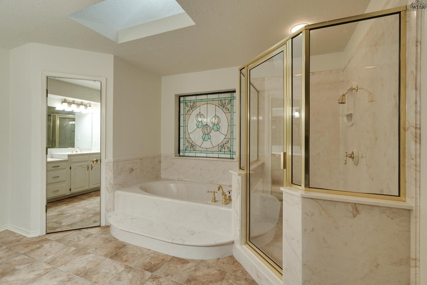 Tucked on a corner lot in Midwestern Park, this 4-bed, 3-bath - photo 21