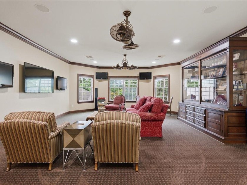 Welcome to this exceptional waterfront estate in prestigious - photo 41