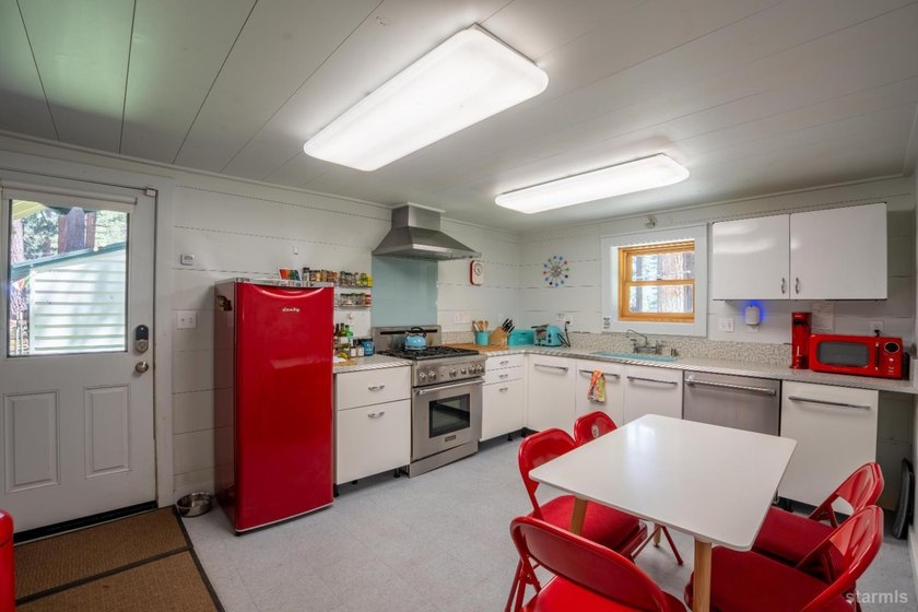 This property features a main single-family home alongside a - photo 5