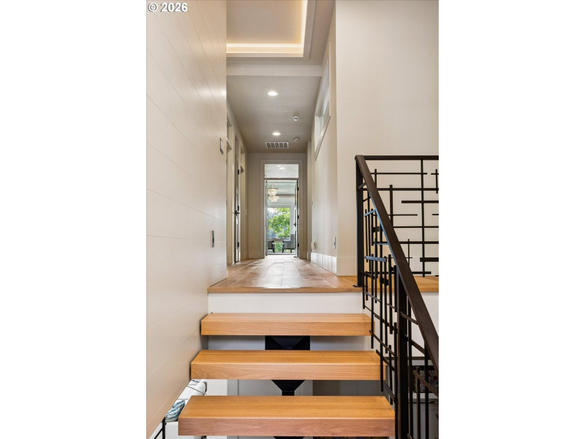 Tucked thoughtfully back from the street, this striking modern - photo 21