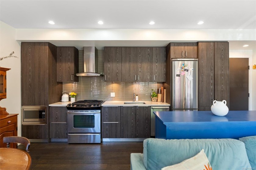 Just minutes from Cook Street Village, this bright ground-level - photo 4