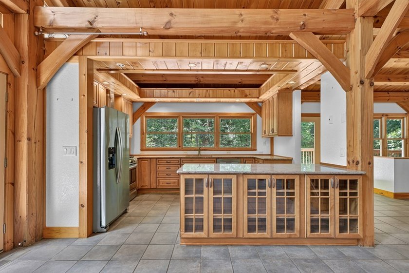 True Timber Frame Home on 49.43 private acres! Escape to your - photo 11