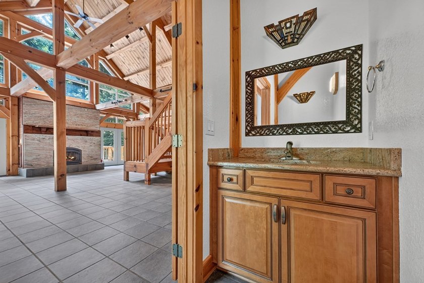 True Timber Frame Home on 49.43 private acres! Escape to your - photo 16