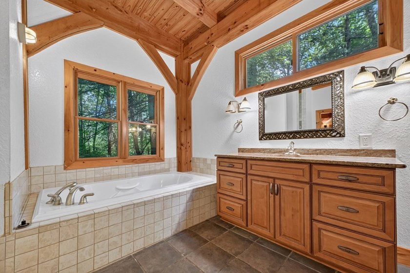 True Timber Frame Home on 49.43 private acres! Escape to your - photo 21
