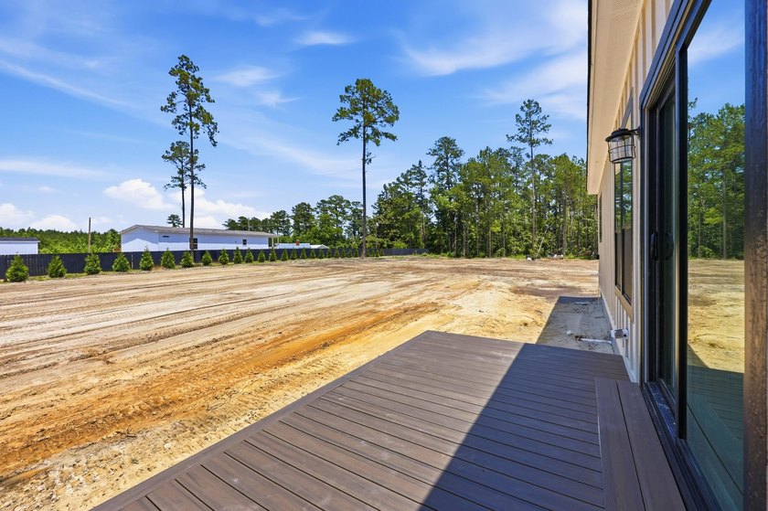 Welcome to 670 Kent Road, where a beautiful gated brick entrance - photo 34