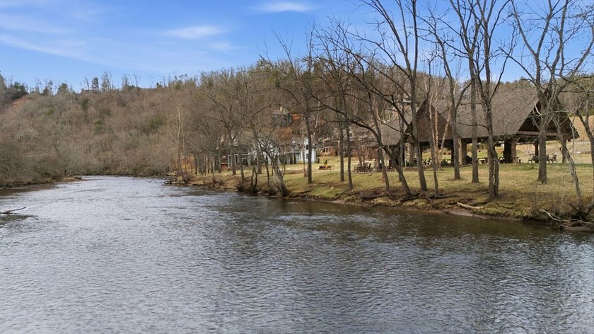 Embrace the mountain river lifestyle in the sought-after - photo 9