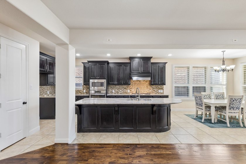 Welcome to this charming North-facing home in the highly - photo 11