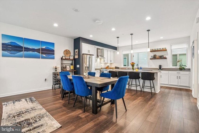 Experience modern riverfront living at its finest in one of - photo 3