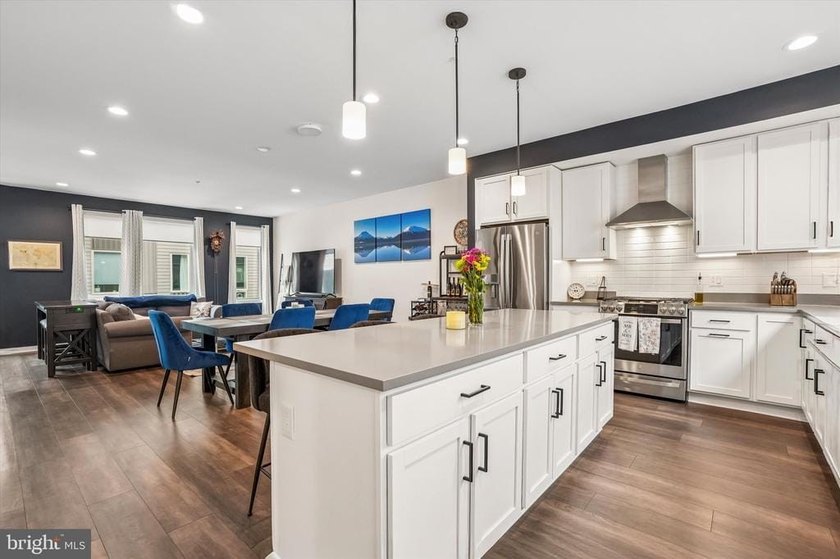 Experience modern riverfront living at its finest in one of - photo 4
