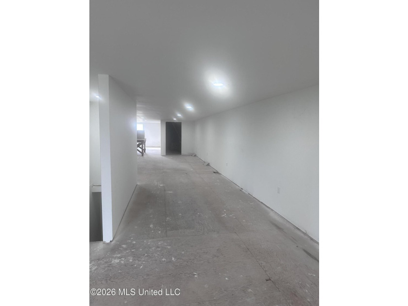 Endless possibilities await in this spacious two-story building - photo 2