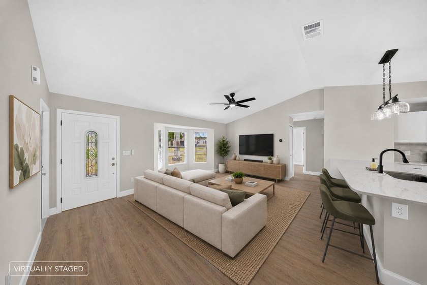 Welcome home to this beautifully updated modern residence where - photo 12