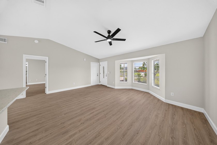 Welcome home to this beautifully updated modern residence where - photo 13