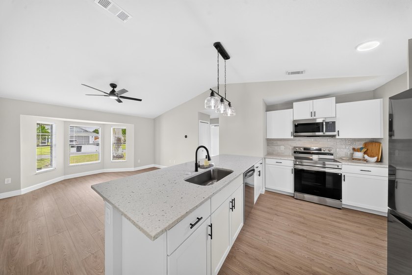 Welcome home to this beautifully updated modern residence where - photo 17