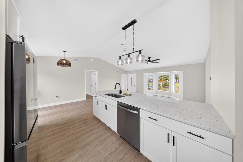 Welcome home to this beautifully updated modern residence where - photo 19