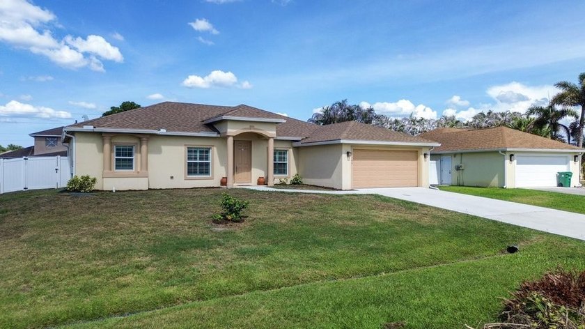 Welcome to this spacious single-story home in Port St. Lucie - photo 3