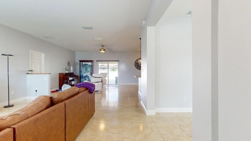 Welcome to this spacious single-story home in Port St. Lucie - photo 6