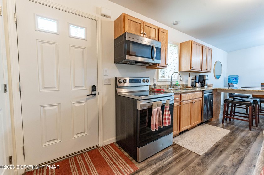 Built in 2023, this beautiful raised ranch offers the perfect - photo 3