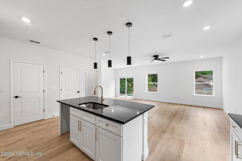 Welcome home to modern living, quality craftsmanship, and - photo 4