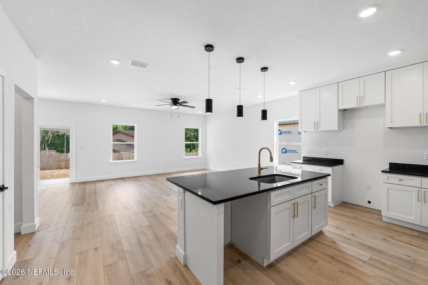 Welcome home to modern living, quality craftsmanship, and - photo 8
