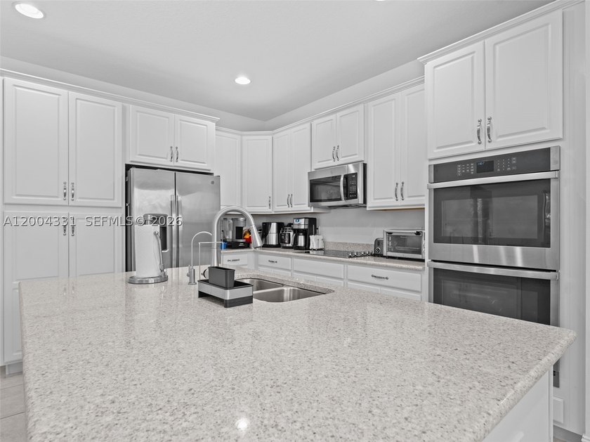Welcome to gated living in the heart of Boca Raton. This - photo 12