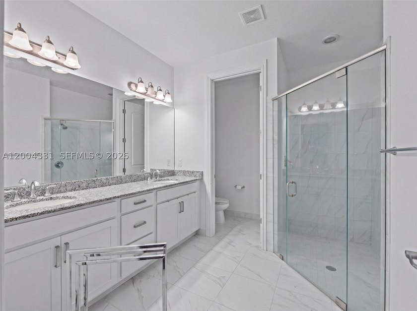 Welcome to gated living in the heart of Boca Raton. This - photo 29