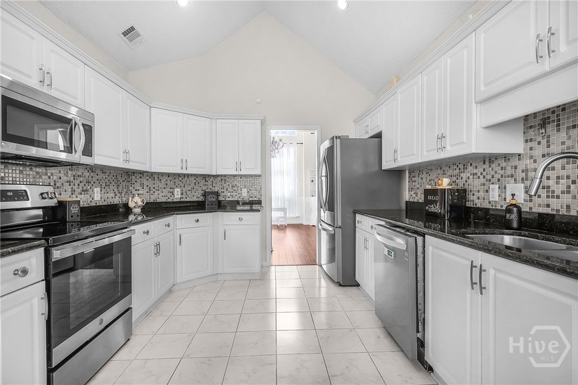 New Price! Welcome to this well-maintained 4-bedroom, 3-bath - photo 22