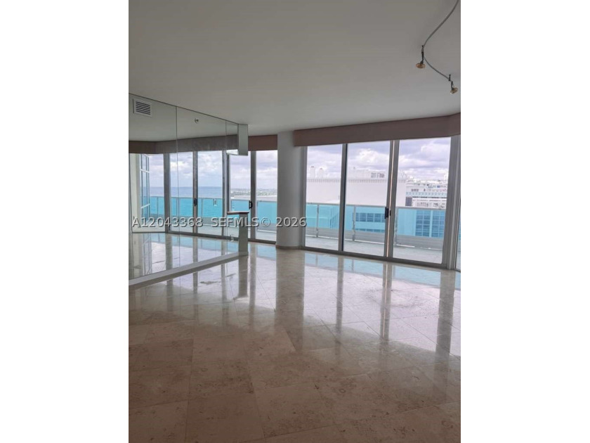 Beach's most sought-after boutique oceanfront buildings! In the - photo 2
