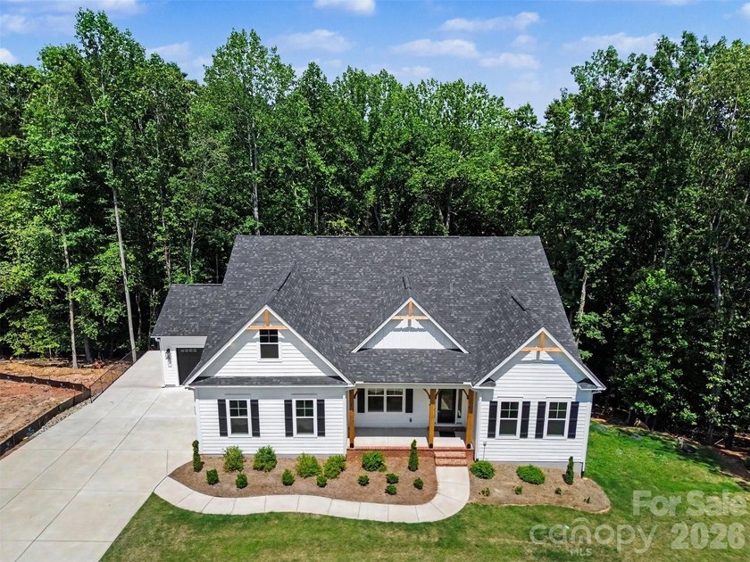 Move-in ready new construction in the gated lakefront community - photo 12