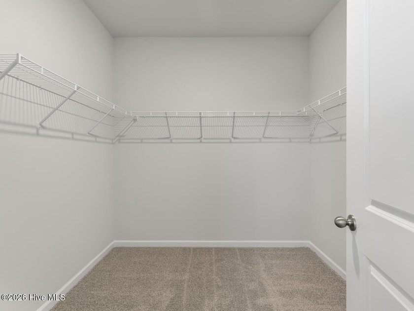 ''The Darby floor plan features an open-concept layout with a - photo 22