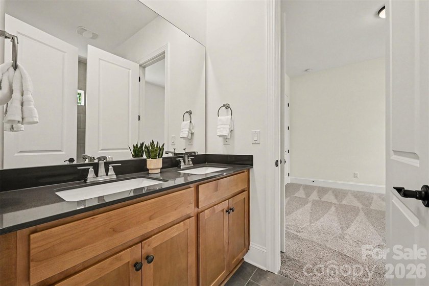 Move-in ready new construction in the gated lakefront community - photo 34