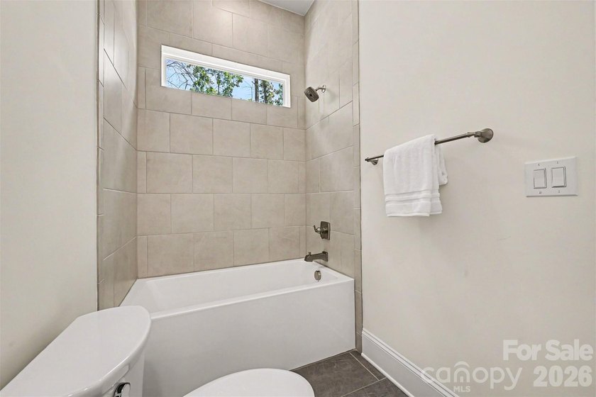 Move-in ready new construction in the gated lakefront community - photo 35
